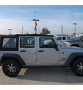 jeep wrangler unlimited 2010 silver suv sport gasoline 6 cylinders 2 wheel drive automatic 77090