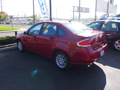 ford focus 2009 red sedan se gasoline 4 cylinders front wheel drive automatic 91010