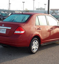 nissan versa 2011 dk  red sedan 1 8 s gasoline 4 cylinders front wheel drive automatic 77074