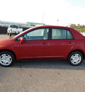 nissan versa 2011 dk  red sedan 1 8 s gasoline 4 cylinders front wheel drive automatic 77074