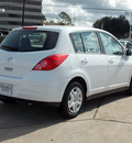nissan versa 2011 white hatchback 1 8 s gasoline 4 cylinders front wheel drive automatic 77074