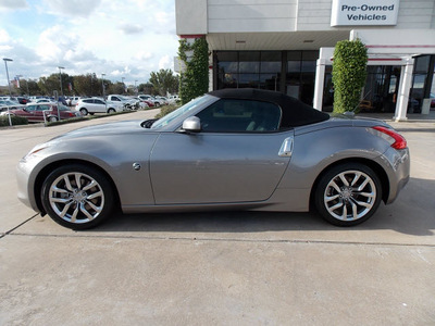 nissan 370z 2010 lt  gray coupe roadster touring gasoline 6 cylinders rear wheel drive shiftable automatic 77477