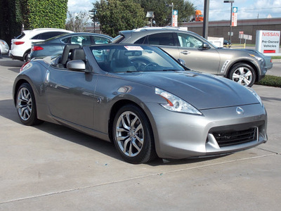 nissan 370z 2010 lt  gray coupe roadster touring gasoline 6 cylinders rear wheel drive shiftable automatic 77477