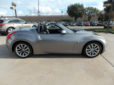 nissan 370z 2010 lt  gray coupe roadster touring gasoline 6 cylinders rear wheel drive shiftable automatic 77477