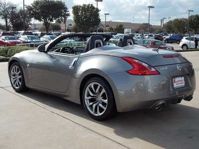 nissan 370z 2010 lt  gray coupe roadster touring gasoline 6 cylinders rear wheel drive shiftable automatic 77477