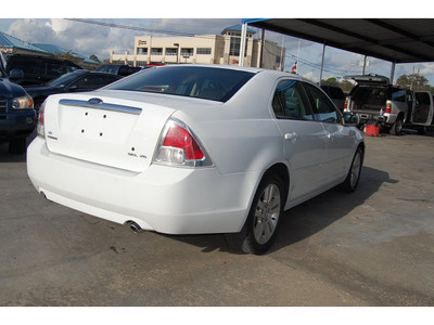 ford fusion 2006 white sedan v6 sel gasoline 6 cylinders front wheel drive automatic with overdrive 77627