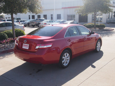 toyota camry 2010 red sedan le gasoline 4 cylinders front wheel drive automatic 76053