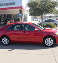 toyota camry 2010 red sedan le gasoline 4 cylinders front wheel drive automatic 76053