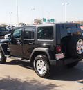 jeep wrangler unlimited 2011 black suv sport gasoline 6 cylinders 4 wheel drive 6 speed manual 76053