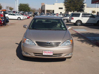 toyota camry 2004 tan sedan xle gasoline 4 cylinders front wheel drive automatic 76053