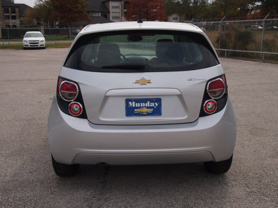 chevrolet sonic 2013 silver hatchback ls gasoline 4 cylinders front wheel drive not specified 77090