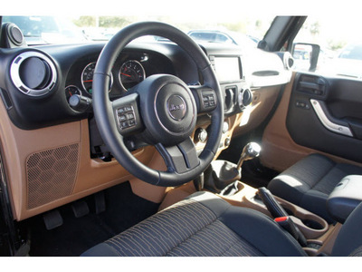 jeep wrangler 2012 black suv sahara gasoline 6 cylinders 4 wheel drive 6 speed manual 33157