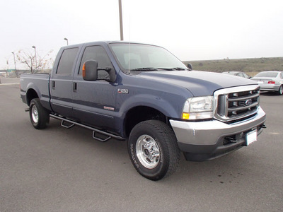 ford f 250 super duty 2004 blue lariat diesel 8 cylinders 4 wheel drive automatic with overdrive 99352