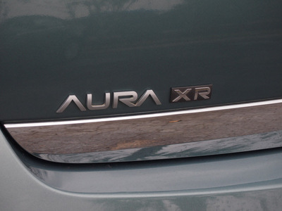saturn aura 2009 green sedan xr gasoline 4 cylinders front wheel drive automatic 77581