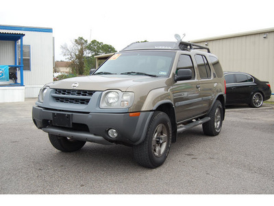 nissan xterra 2002 gold suv se gasoline 6 cylinders 4 wheel drive automatic with overdrive 77627