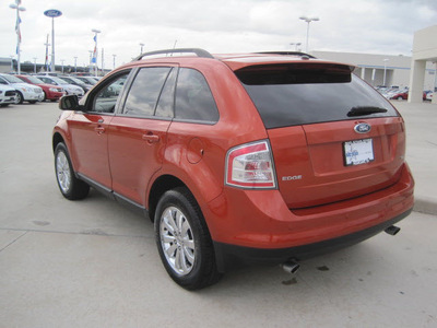 ford edge 2007 orange suv 4dr fwd sel gasoline 6 cylinders front wheel drive automatic 77578