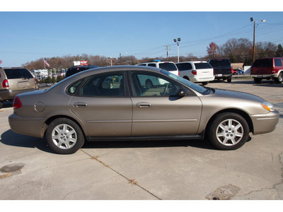 ford taurus 2007 gold sedan se gasoline 6 cylinders front wheel drive automatic 28217