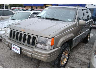 jeep grand cherokee 1997 brown suv limited gasoline 8 cylinders 4 wheel drive automatic 78217