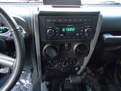 jeep wrangler 2007 green suv sahara gasoline 6 cylinders 4 wheel drive automatic 98371