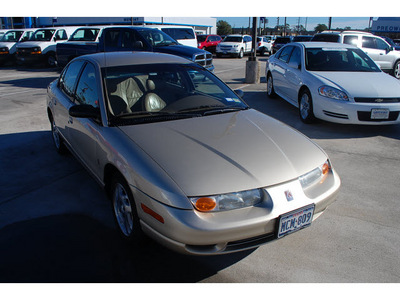 saturn s series 2002 gold sedan sl2 gasoline 4 cylinders front wheel drive 5 speed manual 77090