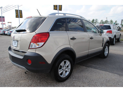 saturn vue 2009 gold suv xe gasoline 4 cylinders front wheel drive 4 speed automatic 77539