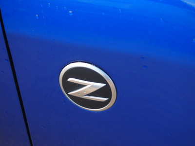 nissan 350z 2006 blue enthusiast gasoline 6 cylinders rear wheel drive standard 77539