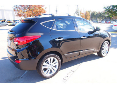 hyundai tucson 2013 black limited gasoline 4 cylinders front wheel drive automatic 77074