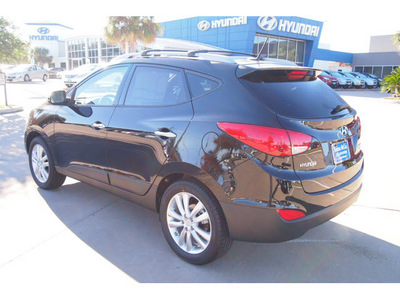 hyundai tucson 2013 black limited gasoline 4 cylinders front wheel drive automatic 77074