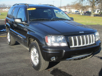 jeep grand cherokee 2004 black suv special edition gasoline 6 cylinders 4 wheel drive automatic 62863