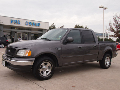 ford f 150 2003 dk  gray xlt gasoline 8 cylinders sohc rear wheel drive automatic with overdrive 76011