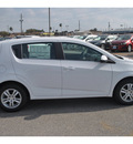 chevrolet sonic 2013 off white hatchback lt gasoline 4 cylinders front wheel drive automatic 78521