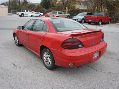 pontiac grand am 2004 red sedan se1 gasoline 6 cylinders front wheel drive automatic 75062