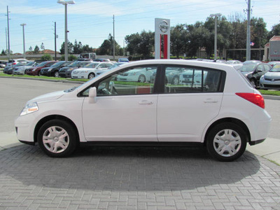 nissan versa 2011 white hatchback gasoline 4 cylinders front wheel drive automatic 33884