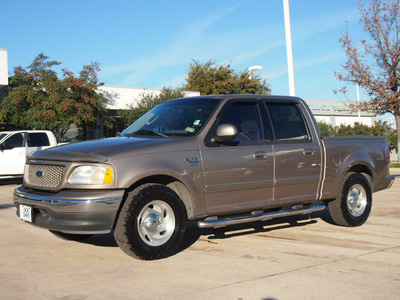 ford f 150 2003 beige xlt gasoline 8 cylinders sohc rear wheel drive automatic with overdrive 76011