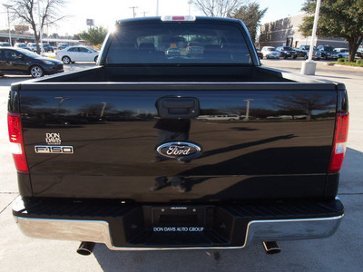 ford f 150 2007 black xlt gasoline 8 cylinders rear wheel drive automatic with overdrive 76011