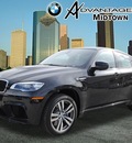 bmw x6 m 2013 black sapphire meta gasoline 8 cylinders all whee drive automatic 77002