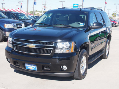 chevrolet tahoe 2011 black suv lt 8 cylinders automatic 77090
