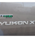gmc yukon xl 2011 brown suv slt flex fuel 8 cylinders 4 wheel drive automatic 79407