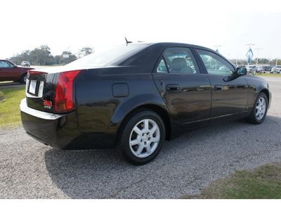 cadillac cts 2006 black sedan gasoline 6 cylinders rear wheel drive not specified 77531