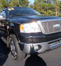 ford f 150 2006 black lariat gasoline 8 cylinders 4 wheel drive automatic with overdrive 32401