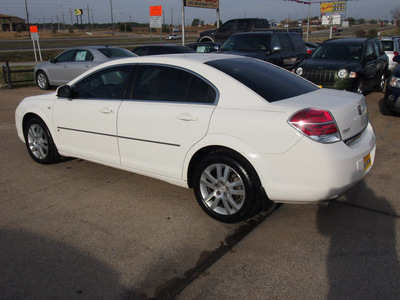 saturn aura 2007 white sedan xe gasoline 6 cylinders front wheel drive automatic with overdrive 77340