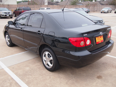toyota corolla 2006 black sedan ce gasoline 4 cylinders front wheel drive automatic 77375