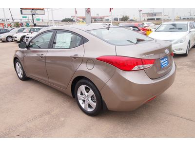 hyundai elantra 2013 gold sedan gls gasoline 4 cylinders front wheel drive automatic 77074