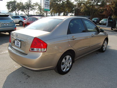 kia spectra 2009 beige sedan ex gasoline 4 cylinders front wheel drive automatic 76011