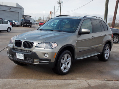 bmw x5 2010 lt  brown suv xdrive30i gasoline 6 cylinders all whee drive shiftable automatic 77074