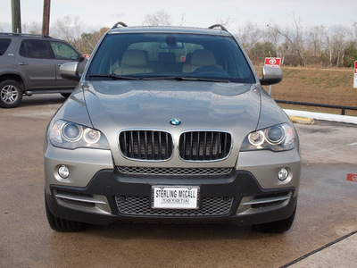 bmw x5 2010 lt  brown suv xdrive30i gasoline 6 cylinders all whee drive shiftable automatic 77074