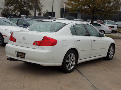 infiniti g35 2005 off white sedan gasoline 6 cylinders rear wheel drive shiftable automatic 77074