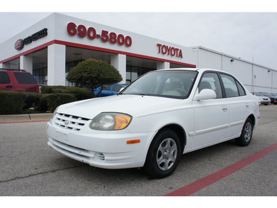 hyundai accent 2003 white sedan gl 4 cylinders dohc 6 speed manual 76543