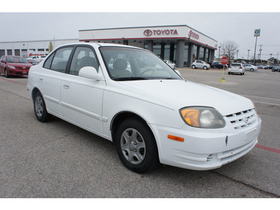 hyundai accent 2003 white sedan gl 4 cylinders dohc 6 speed manual 76543