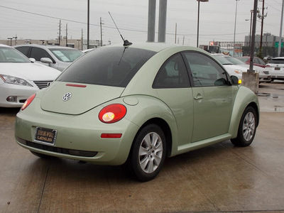 volkswagen new beetle 2009 green hatchback gasoline 5 cylinders front wheel drive shiftable automatic 77074